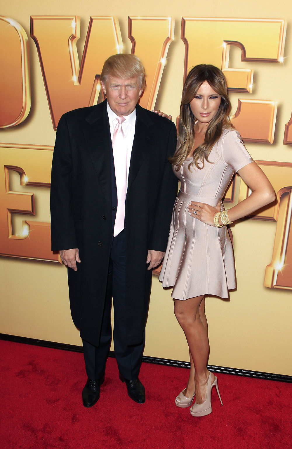 Donald Trump and his wife Melania arrive for the premiere of the film "Tower Heist" in New York October 24, 2011. REUTERS/Lucas Jackson (UNITED STATES - Tags: ENTERTAINMENT BUSINESS)
