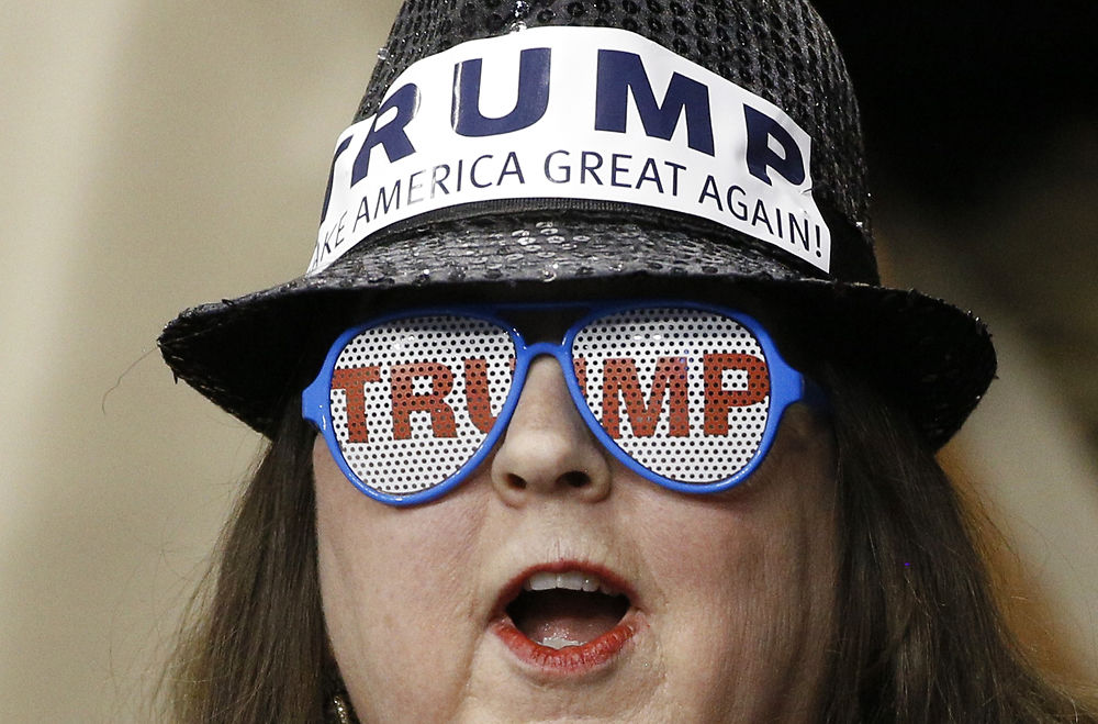 A supporter of Republican U.S. presidential candidate Donald Trump attends a Trump campaign rally at the Verizon Wireless Arena in Manchester, New Hampshire, February 8, 2016. REUTERS/Rick Wilking